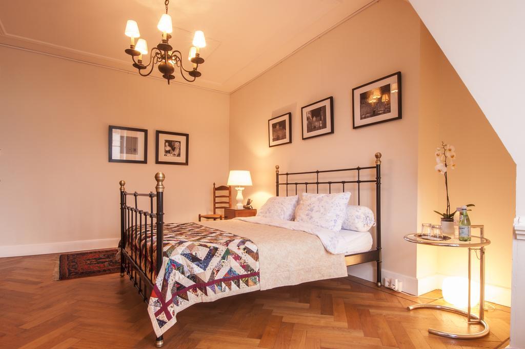 De Schiedamse Suites Kamer foto